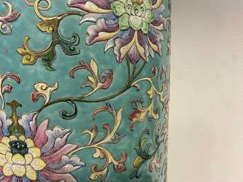 A large Chinese famille rose cylindrical vase with applied lotus scrolls, Jiaqing/Daoguang